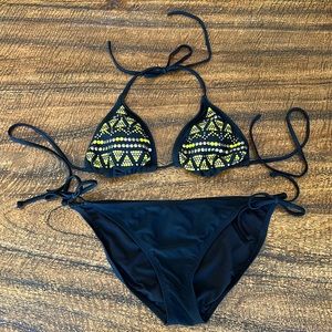 Xhileration size large black and neon yellow beaded string 2 piece bikini